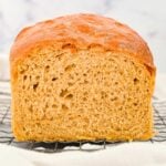 square image of the open side of sliced homemade sandwich bread.